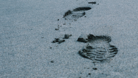 Imprints of footprints on sand